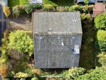Drohnenaufnahme Freistehende Liegenschaft mit Privatweg, Garage, Garten und viel Gestaltungspotenzial