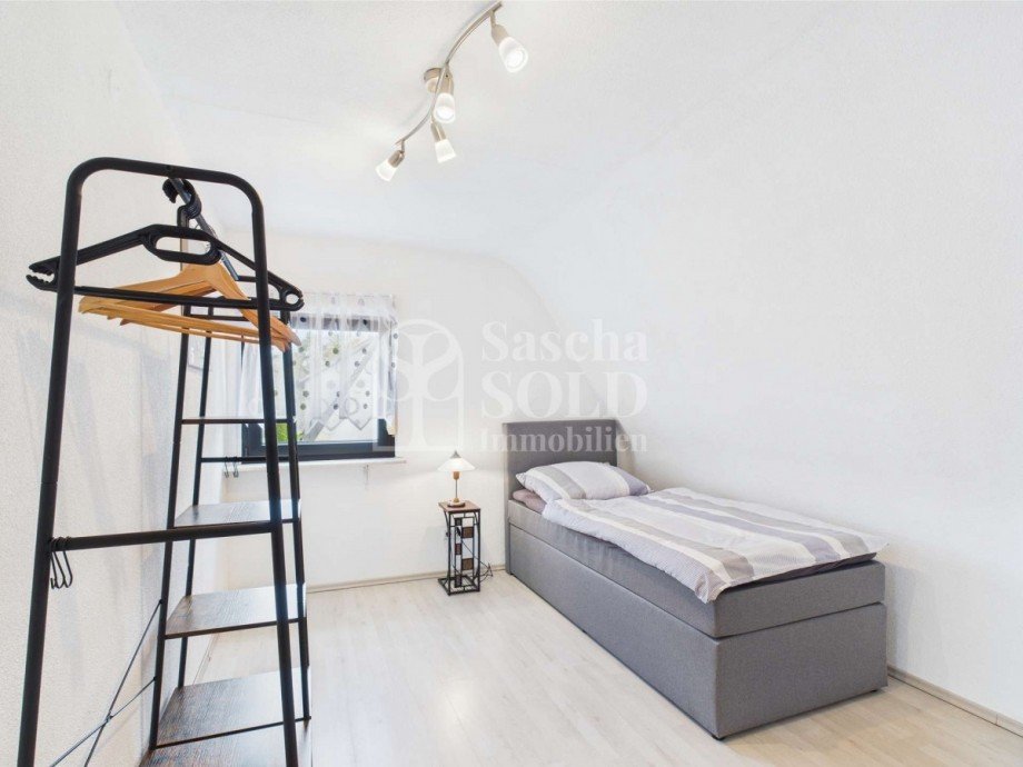 WE1 - Schlafzimmer 1 Mehrfamilienhaus Friedrichsthal