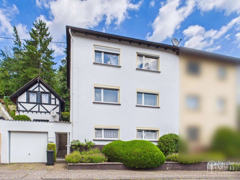 Stra�enansicht Spiesen-Elversberg Doppelhaush�lfte Wohnhaus mit 3 Wohnebenen, Garten und Garage in ruhiger und gefragter Wohnlage