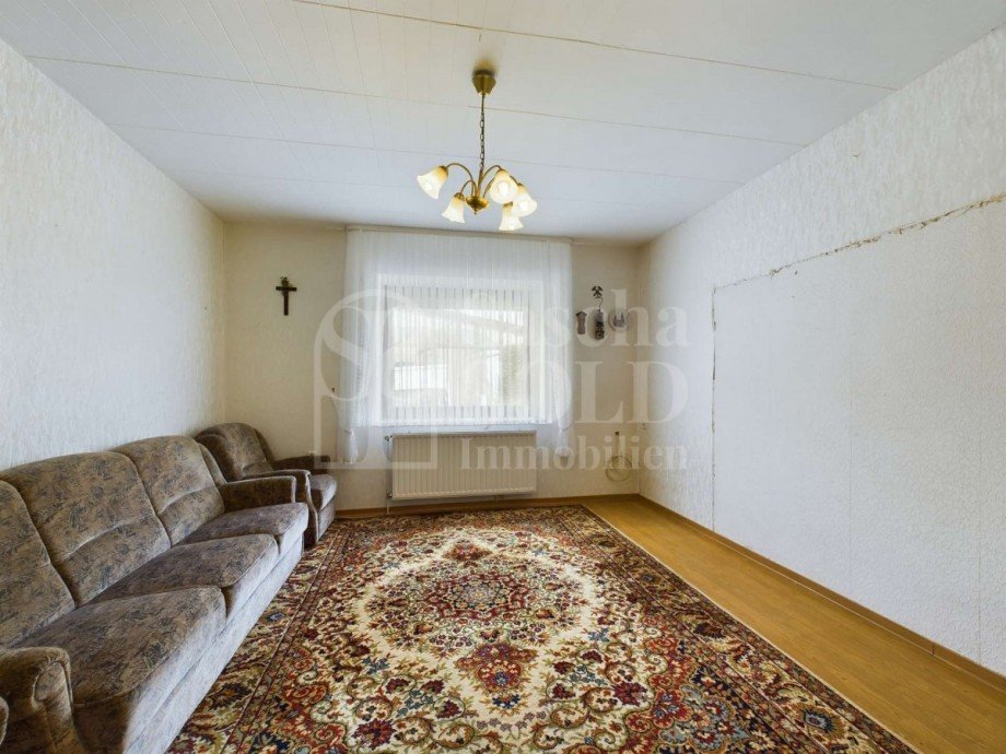 EG - Wohnzimmer Zweifamilienhaus Gersheim