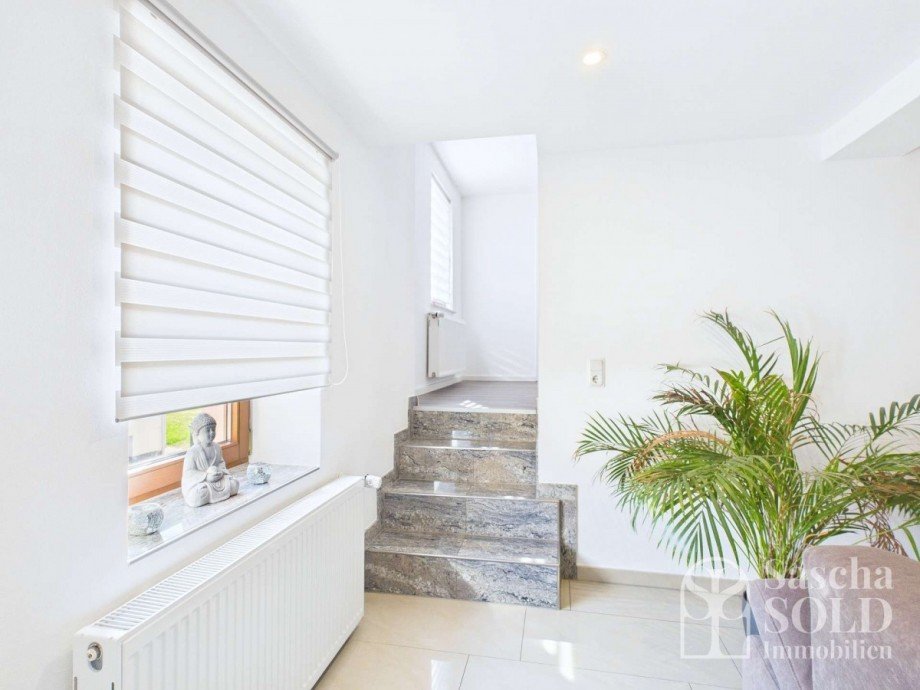Treppe zu den Wohnr�umen Wohnung Riegelsberg